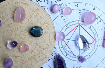 Beautiful amethyst crystals and dry herbs  with symbols of the zodiac signs. Predictions,...