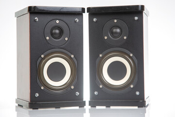 two stereo audio speakers on a white background. sound and media