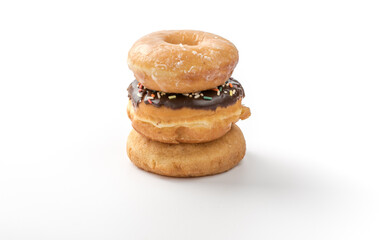 tower of assorted donuts isolated on white background