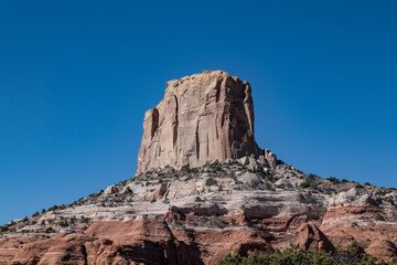 Fototapeta premium Square Butte is a sandstone summit located on Navajo Nation land, in Coconino County of northern Arizona. Carmel Formation with Entrada Sandstone,San Rafael Group. Arizona State Route 98 