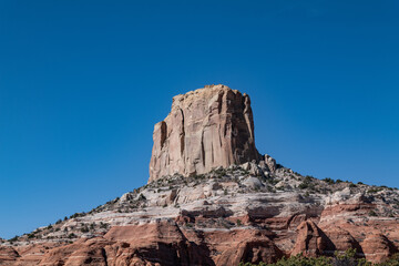 Fototapeta premium Square Butte is a sandstone summit located on Navajo Nation land, in Coconino County of northern Arizona. Carmel Formation with Entrada Sandstone,San Rafael Group. Arizona State Route 98 