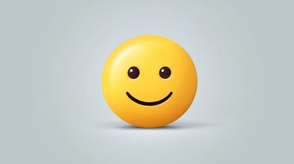 Fototapeta premium A cheerful, yellow, 3D smiley face with simple features against a light gray background casts a subtle shadow. It has a slight sheen