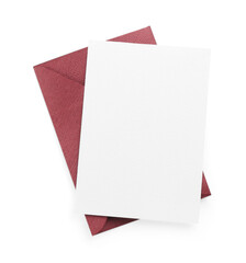 Blank invitation card and envelope isolated on white, top view. Space for design