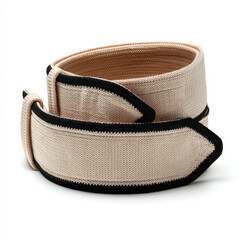 A close-up view of a beige elastic band with black edges, showcasing its texture and design