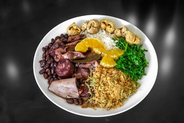 The best traditional Brazilian feijoada completely served in the most authentic style accompanied by the irresistible and iconic cachaça caipirinha