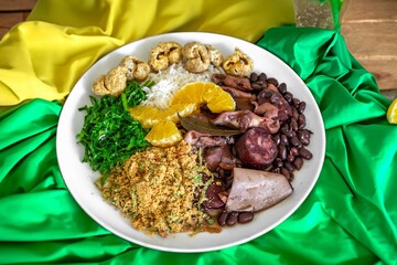 The best traditional Brazilian feijoada completely served in the most authentic style accompanied by the irresistible and iconic cachaça caipirinha
