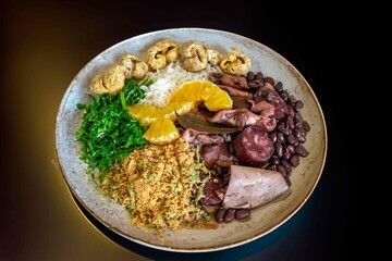 The best traditional Brazilian feijoada completely served in the most authentic style accompanied by the irresistible and iconic cachaça caipirinha