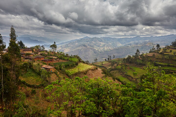 Obraz premium Terraced fields and patchwork farmland near La Jalca Grande, Amazonas, Peru — a living landscape shaped by generations of farmers, reflecting ancient Andean agricultural traditions