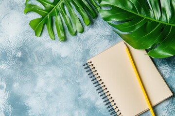Detailed Image of Plant and Pencil Near Notebook