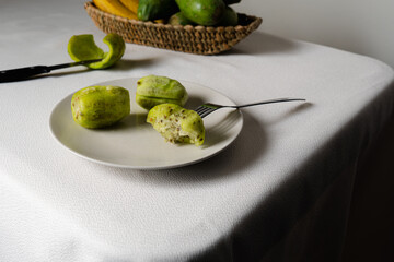 Freshly peeled prickly pears on a white plate, ready to be eaten