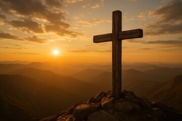 Sacred wooden cross silhouetted against dramatic sunset sky on peaceful mountain summit