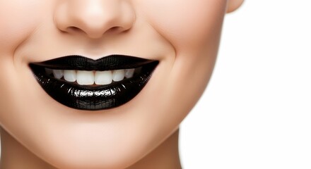 Fototapeta premium Close-up of a smiling woman with glossy black lipstick and perfect white teeth