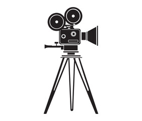 Silhouette of an old movie camera on a tripod. Vintage movie camera on tripod silhouette.