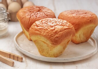 Breudher or Bluder, also known as Brueder or Bloeder (pronounced as broo-dhuh), is a traditional Sri Lankan Dutch Burgher buttery yeast cake, baked in a fluted mould. A variation, Bleuda, Kueh Bleuda