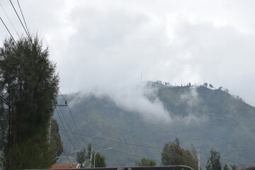 Mountain landscape with clouds and fog