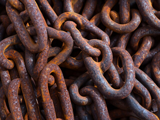 Fototapeta premium rusty anchor chains in a harbor