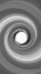 Obraz premium Swirling vortex of grayscale tones converges to a bright center with subtle texture