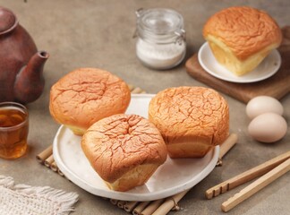 Breudher or Bluder, also known as Brueder or Bloeder (pronounced as broo-dhuh), is a traditional Sri Lankan Dutch Burgher buttery yeast cake, baked in a fluted mould. A variation, Bleuda, Kueh Bleuda