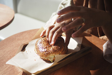 Enjoying a freshly baked pastry at a cozy cafe