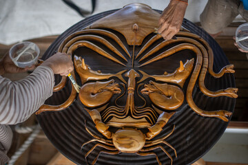 varnished headpiece, stylized mask, collage of marine animals, natural wood, handmade, teak