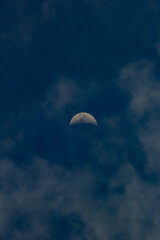 Moon in the blue sky with cloudsbe used as background