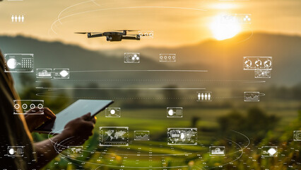 Farmer using tablet to control drone in precision farming