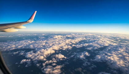 Peaceful Sky Above the Clouds Captured Mid-Flight Through Plane Window