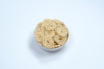 isolated white background original Indonesian raw crackers, uncooked crackers, usually used as an ingredient for making seblak
