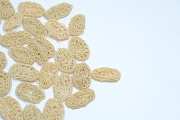 isolated white background original Indonesian raw crackers, uncooked crackers, usually used as an ingredient for making seblak