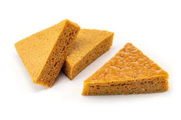 Several pieces of steamed malay cake (ma lai gao) on white background.