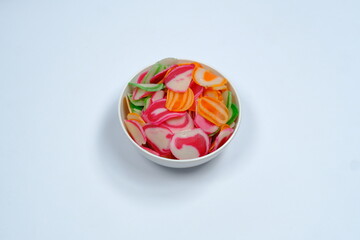 isolated white background original Indonesian raw crackers, uncooked crackers, usually used as an ingredient for making seblak