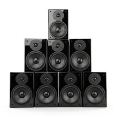 Black audio speakers arranged in pyramid formation sound music