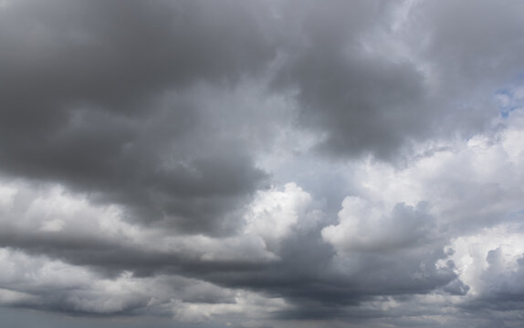 The dark sky weighed down by dark clouds