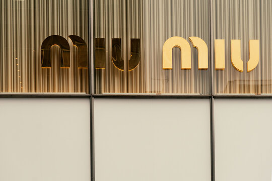 Tokyo, Japan - May 12, 2025: Miu Miu is an Italian high fashion women's clothing and accessory. The logo at the store in shopping mall.