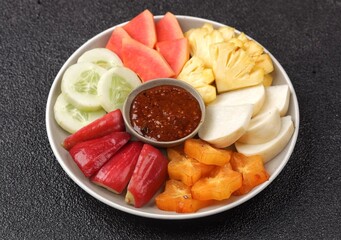 Rujak buah. Fruit Rujak or Indonesian fruit salad is a fresh fruit dish enjoyed with addictive peanut sauce.
