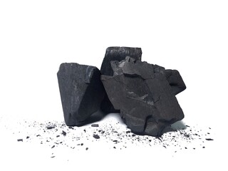 Natural wood charcoal is traditional charcoal made using hardwood isolated on a white background....