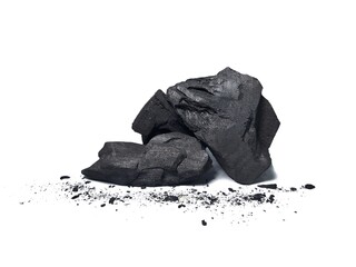 Natural wood charcoal is traditional charcoal made using hardwood isolated on a white background....