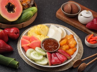 Rujak buah. Fruit Rujak or Indonesian fruit salad is a fresh fruit dish enjoyed with addictive peanut sauce.