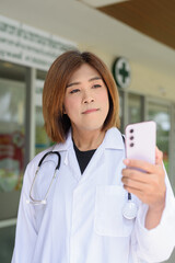 Transgender non binary doctor with stethoscope