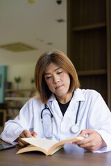 Transgender non binary doctor with stethoscope