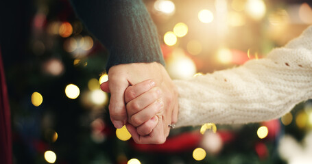 Christmas, holding hands or mother with girl, home or bonding together with holiday season....