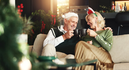 Senior, happy couple or coffee with toast for Christmas, love or romance in festive season in home. Smile, marriage support and elderly people bonding on sofa in lounge for holiday, cheers and tea