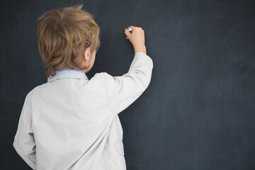 Cute pupil writing on board © vectorfusionart