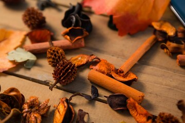 Close-up of cinnamons and dried fruits