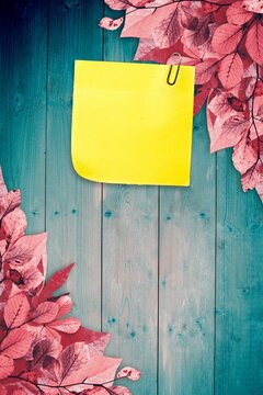 Fototapeta Autumn leaves with yellow note