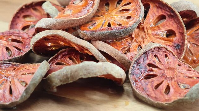 Dried bael fruit in a plate