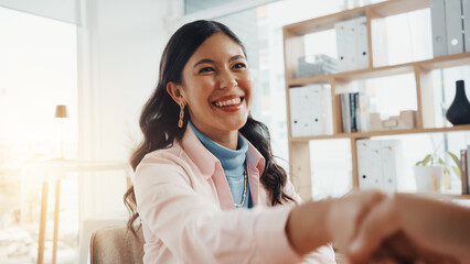 Happy, business woman and meeting with handshake for partnership, agreement or deal in workplace....