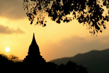 detailed color picture of silhouette of temple against sky