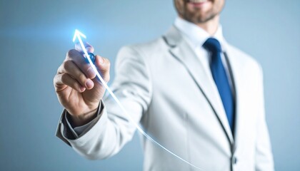 A man makes a gesture with his right hand as if drawing a curved line in the air