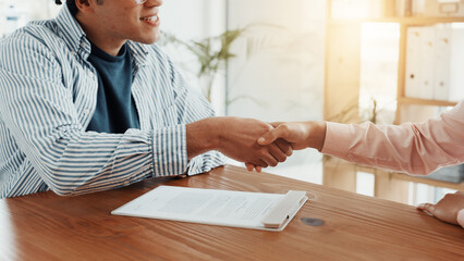 Contract, business people and interview with handshake for hiring, meeting or agreement together at...
